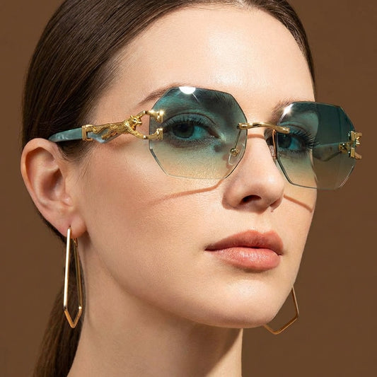 Women's Rimless Geometric Sunglasses with Sculptural Gold Panther Hardware Detail